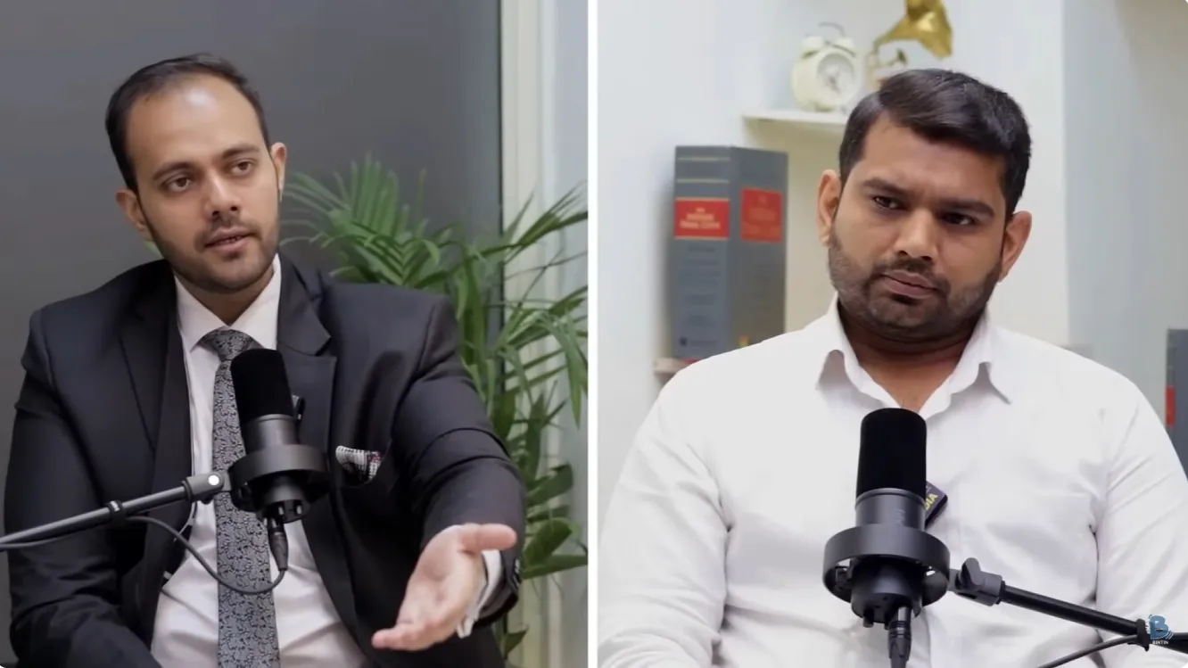 Two speakers in a recorded Bintin interview
